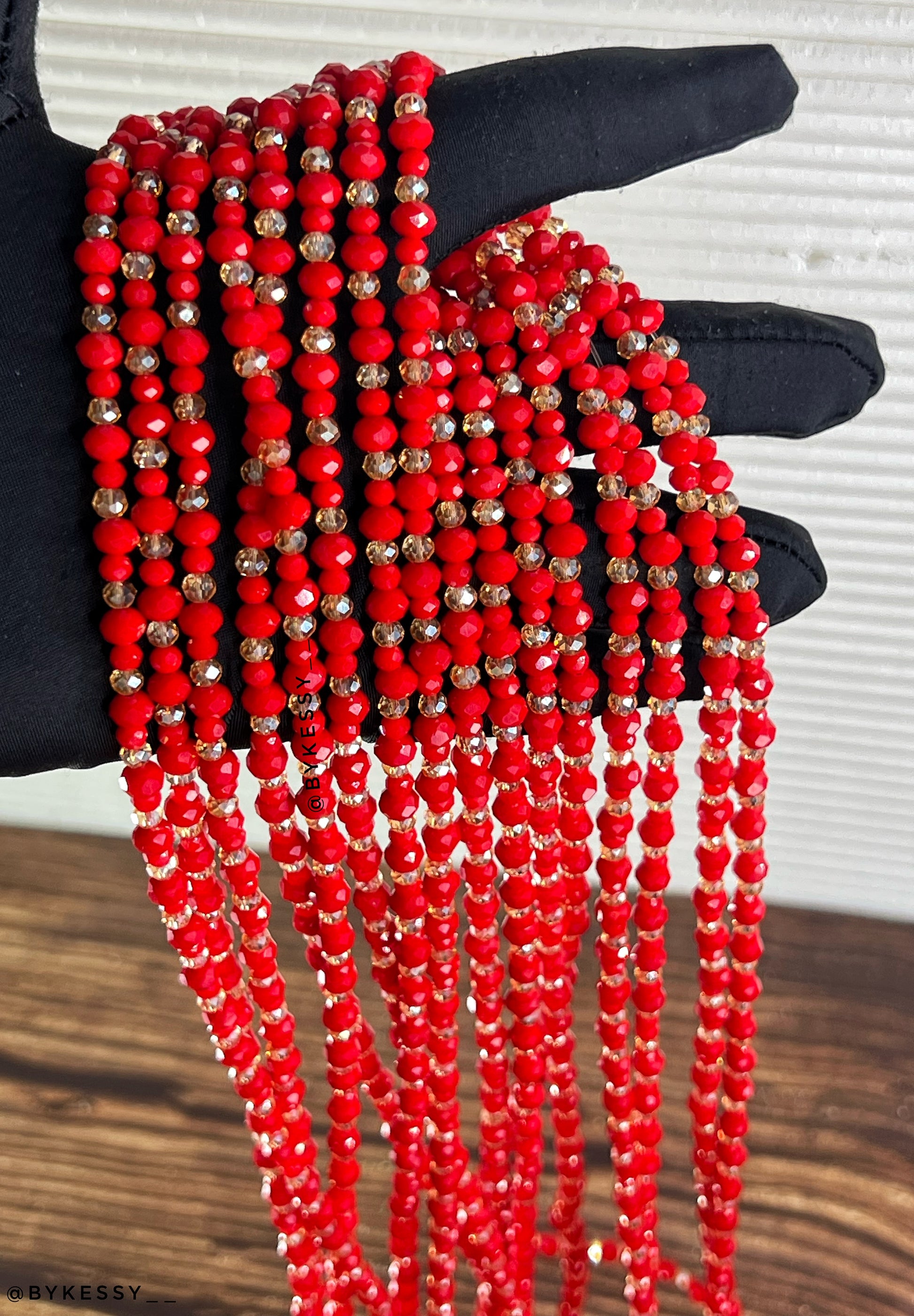 Bold red crystal waist beads with gold accents for wholesale and resale