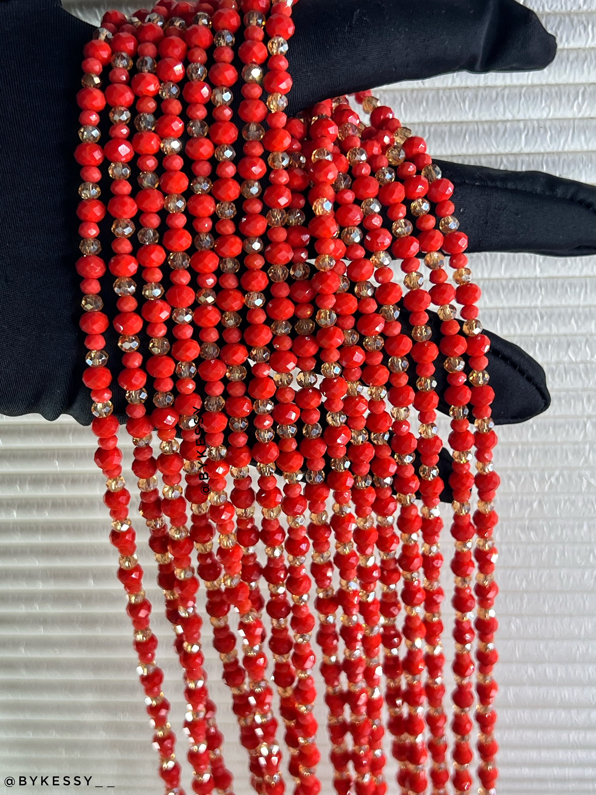 Traditional coral-tone crystal waist beads for stacking and resale